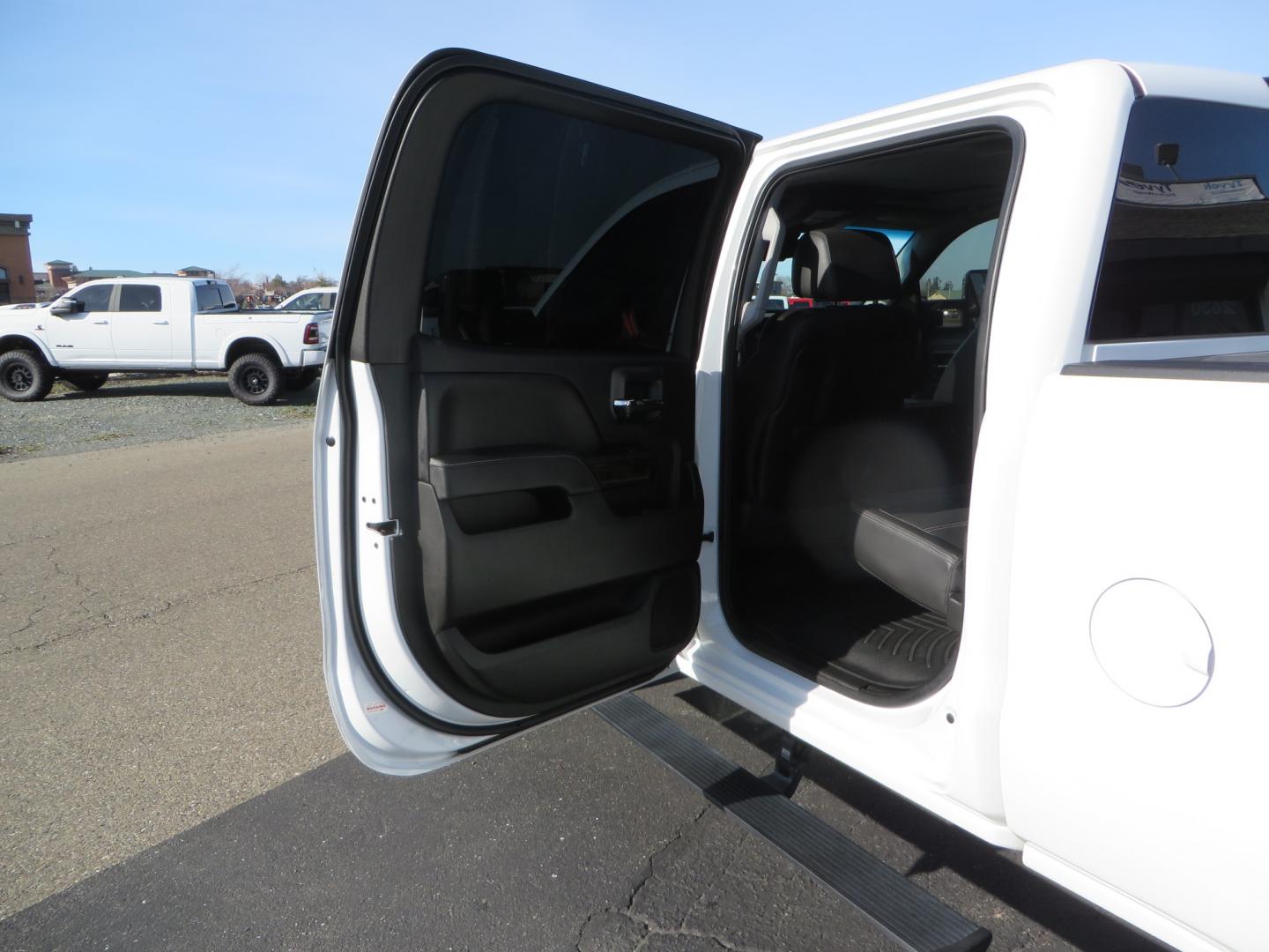 2015 White GMC Sierra 2500 HD Crew Cab Denali (1GT120E88FF) with an V8 Turbo Dsl 6.6L engine, Auto 6-Spd Allison OD transmission, located at 2630 Grass Valley Highway, Auburn, CA, 95603, (530) 508-5100, 38.937893, -121.095482 - 2015 GMC Denali 2500 6.6L Duramax Diesel. Cognito 4-6" lift kit, Cognito traction bars, Cognito idler and pitman support, Kryptonite upper control arms, Fox remote reservoir shocks, Amp power steps, Fuel Offroad wheels, Nitto Ridge Grappler tires, Alpine Stereo Firestone ride rite air bags, Transfer - Photo#34